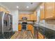 Modern kitchen with stainless steel appliances and an island at 3333 Castleberry Village Cir, Cumming, GA 30040