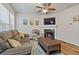 Cozy living room featuring a fireplace, and comfortable seating at 3333 Castleberry Village Cir, Cumming, GA 30040