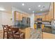 Modern kitchen with stainless steel appliances and an island at 3333 Castleberry Village Cir, Cumming, GA 30040