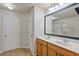 Double vanity bathroom with large mirror and shower at 3333 Castleberry Village Cir, Cumming, GA 30040