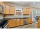 Modern kitchen with stainless steel appliances and an island at 3333 Castleberry Village Cir, Cumming, GA 30040