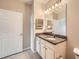 Bathroom with granite countertop and double sinks at 4333 Dunwoody Park # 3401, Dunwoody, GA 30338