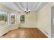 Dining room with hardwood floors and a tray ceiling at 5077 Fieldview Dr, Douglasville, GA 30135