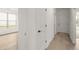 Bright hallway with hardwood floors and access to other rooms at 3719 Tielman St, Snellville, GA 30078