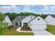 Two-story craftsman style home with a two-car garage at 3719 Tielman St, Snellville, GA 30078