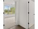 Bright hallway with hardwood floors and access to other rooms at 3719 Tielman St, Snellville, GA 30078