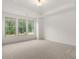 Bright bedroom with treetop views and plush carpeting at 3719 Tielman St, Snellville, GA 30078
