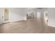 Open concept living room and kitchen with hardwood floors at 3719 Tielman St, Snellville, GA 30078