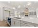 Spacious kitchen island with sink, dishwasher and breakfast bar at 3719 Tielman St, Snellville, GA 30078