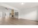 Living room with hardwood floors and a stone fireplace at 3719 Tielman St, Snellville, GA 30078