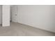 Carpeted bedroom with neutral walls and ample space at 3719 Tielman St, Snellville, GA 30078