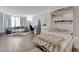 Bright bedroom with gray bedding and built-in shelving at 2870 Pharr Court South # 503, Atlanta, GA 30305