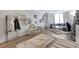 Spacious bedroom with gray bedding and built-in shelving at 2870 Pharr Court South # 503, Atlanta, GA 30305