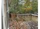 Wooden deck overlooking a wooded backyard at 2520 Conley Dr, Cumming, GA 30040