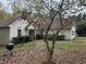 Front of house with driveway and small yard at 2520 Conley Dr, Cumming, GA 30040