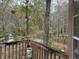 Wooden deck with wooded backyard views, autumn leaves at 2520 Conley Dr, Cumming, GA 30040