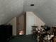 Unfurnished attic space with sloped ceilings and storage at 2520 Conley Dr, Cumming, GA 30040