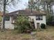 Back of house with deck and stairs leading to yard at 2520 Conley Dr, Cumming, GA 30040