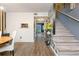 Entryway with stairs and view into dining area at 3103 Reeves Se St, Smyrna, GA 30080