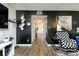 Long hallway with dark walls and hardwood floors at 3103 Reeves Se St, Smyrna, GA 30080