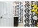 Stylish half bathroom with black and white wallpaper at 3103 Reeves Se St, Smyrna, GA 30080