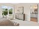 Spacious bedroom with large window, plush seating, and ensuite bathroom access at 925 Willingham Dr # 13, Hapeville, GA 30354