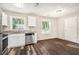 Updated kitchen with white cabinets, granite countertops, and stainless steel appliances at 2648 Santa Monica Nw Dr, Atlanta, GA 30318