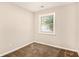 Cozy bedroom with neutral walls and brown carpet at 2648 Santa Monica Nw Dr, Atlanta, GA 30318