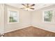 Bright bedroom with neutral walls and plush brown carpet at 2648 Santa Monica Nw Dr, Atlanta, GA 30318