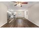 Open living area with wood-look floors and stainless steel appliances at 2648 Santa Monica Nw Dr, Atlanta, GA 30318