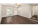 Spacious living room with dark hardwood floors and neutral walls at 2648 Santa Monica Nw Dr, Atlanta, GA 30318