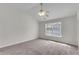 Spacious bedroom with ceiling fan and window at 621 Kenridge Way # 0, Suwanee, GA 30024