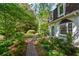 Landscaped front yard with brick pathway at 260 Manning Sw Rd # 127, Marietta, GA 30064