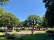 Town square with lush greenery, benches, and people at 260 Manning Sw Rd # 127, Marietta, GA 30064