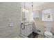 Clean bathroom with a glass shower and white fixtures at 720 Starlight Ln, Atlanta, GA 30342