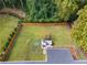 Aerial view of backyard oasis with deck and fire pit at 720 Starlight Ln, Atlanta, GA 30342