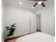 Bedroom with hardwood floors, ceiling fan, and a plant at 3018 Wanda Sw Cir, Atlanta, GA 30315