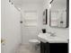 Updated bathroom with subway tile, white vanity, and shower at 3018 Wanda Sw Cir, Atlanta, GA 30315