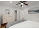 Bedroom with hardwood floors, ceiling fan, and access to bathroom at 3018 Wanda Sw Cir, Atlanta, GA 30315