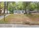 Cute ranch home nestled on a wooded lot with a long driveway at 3018 Wanda Sw Cir, Atlanta, GA 30315