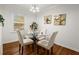 Charming dining area with glass table and neutral decor at 3018 Wanda Sw Cir, Atlanta, GA 30315