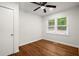 Bright bedroom featuring hardwood floors and ceiling fan at 3018 Wanda Sw Cir, Atlanta, GA 30315