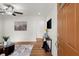 Bright living room with hardwood floors and a ceiling fan at 3018 Wanda Sw Cir, Atlanta, GA 30315