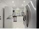Modern kitchen features stainless steel appliances and granite countertops at 3018 Wanda Sw Cir, Atlanta, GA 30315