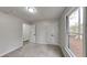 Bright bedroom with carpet, double closet, and window at 245 Southmoor Cir, Stockbridge, GA 30281