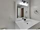 Bathroom with vanity, sink, and mirror at 245 Southmoor Cir, Stockbridge, GA 30281