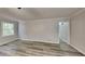 Large bedroom with new flooring and lots of natural light at 245 Southmoor Cir, Stockbridge, GA 30281