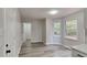 Bright breakfast nook with new flooring and large windows at 245 Southmoor Cir, Stockbridge, GA 30281
