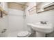 Clean bathroom with white tile and a shower/tub combo at 245 E Simon Nw Ter, Atlanta, GA 30318