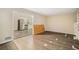 Open living room with a view into the kitchen at 245 E Simon Nw Ter, Atlanta, GA 30318